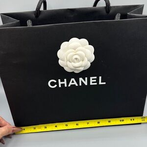 CHANEL Black Bag with White Camellia